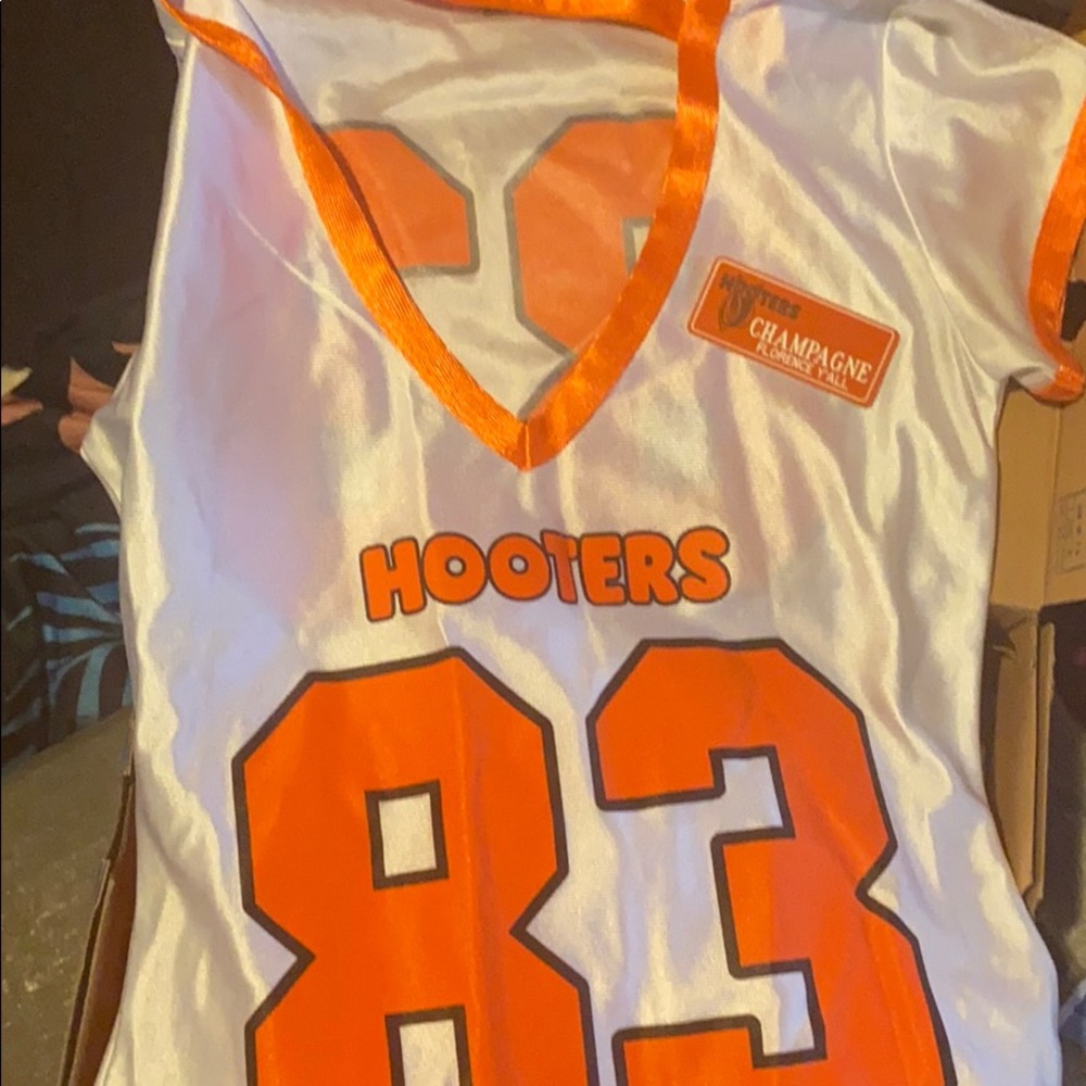 Box of used Hooters Uniforms